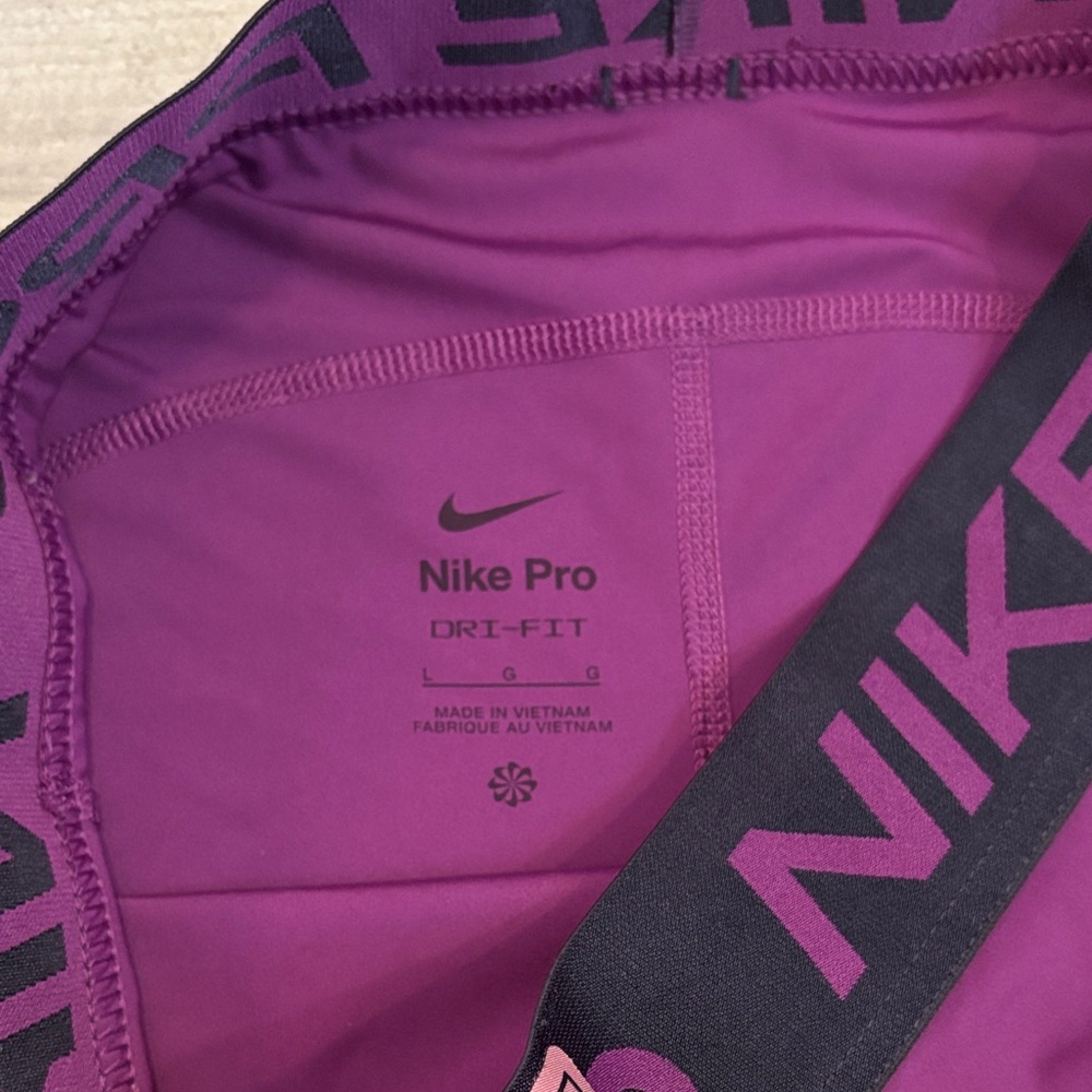 Nike Women's Magenta Athletic Shorts - Picture 2 of 5